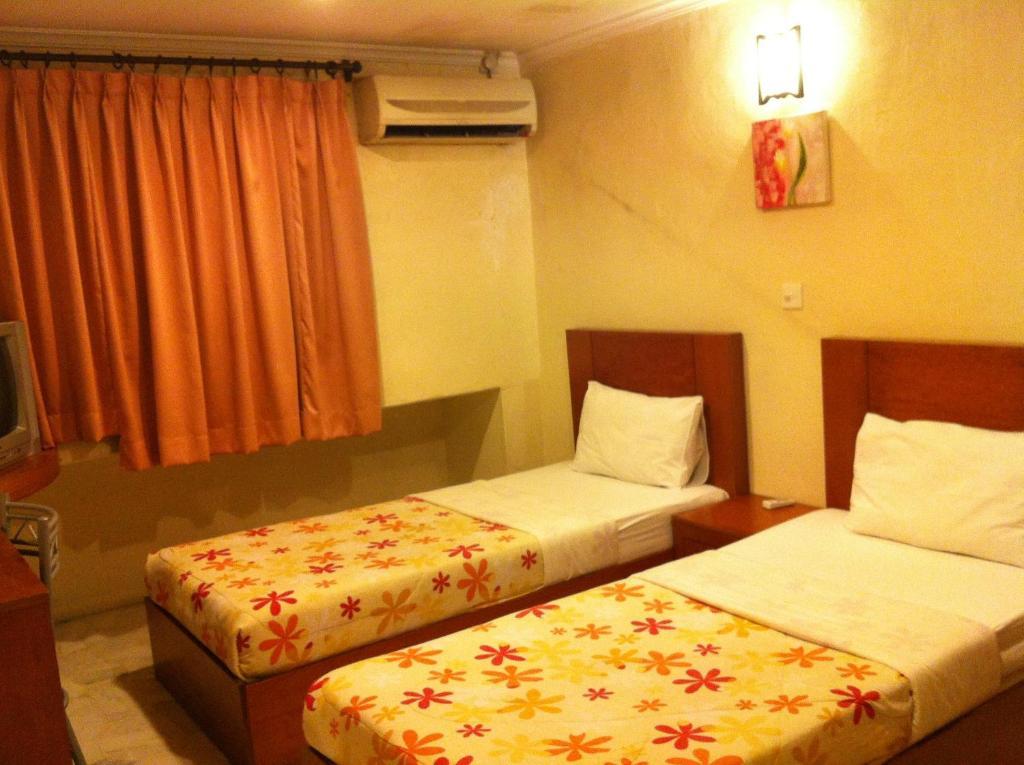City Star Hotel Kulai Zimmer foto